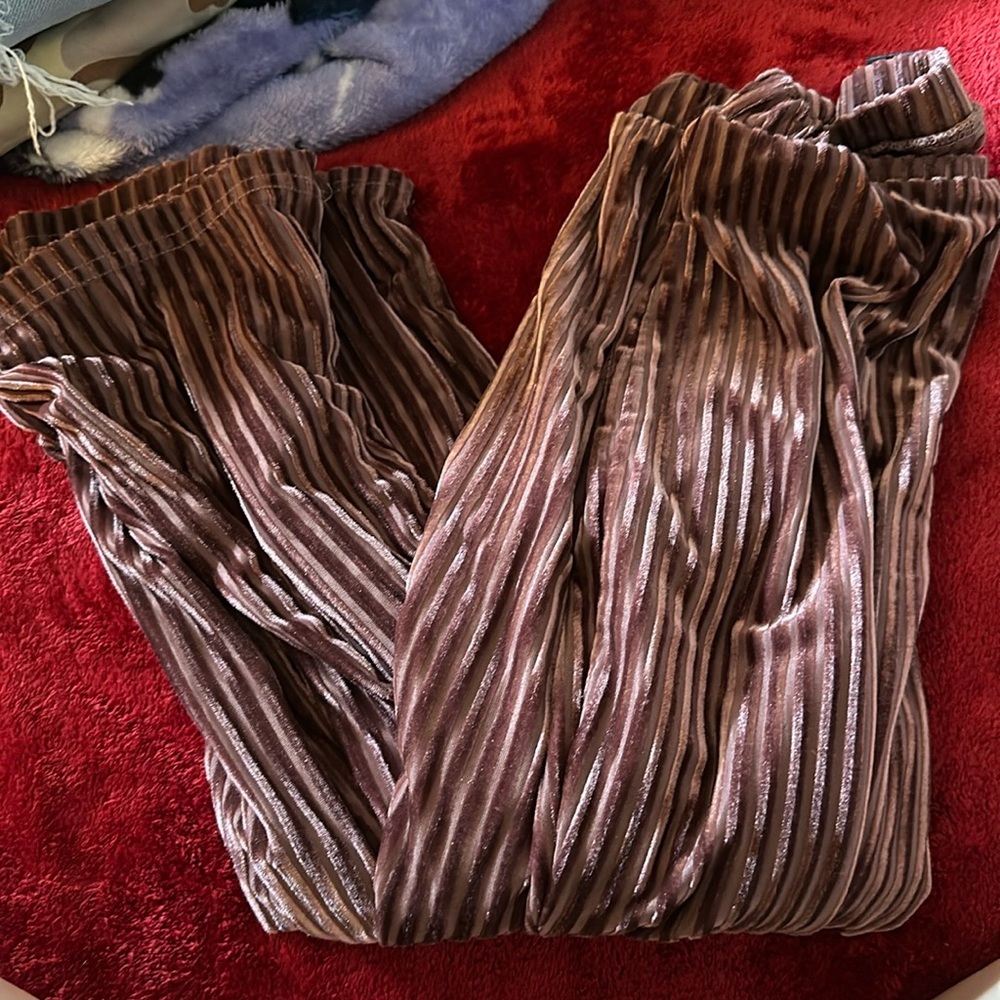 purple flared leggings so the strips